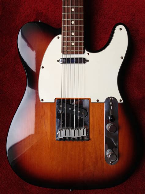 fender telecaster american standard sunburst.